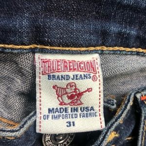 Beautiful True Religion jeans with design on pockets.